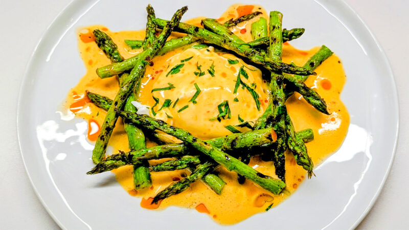 Grilled Asparagus with Calabrian Chili Hollandaise and Poached Egg